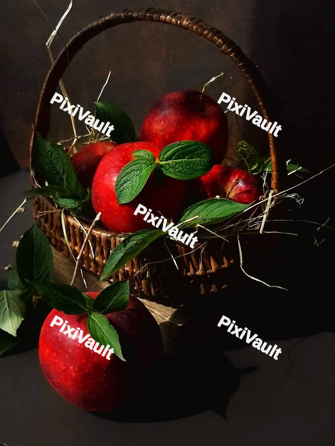 Straw basket with apples